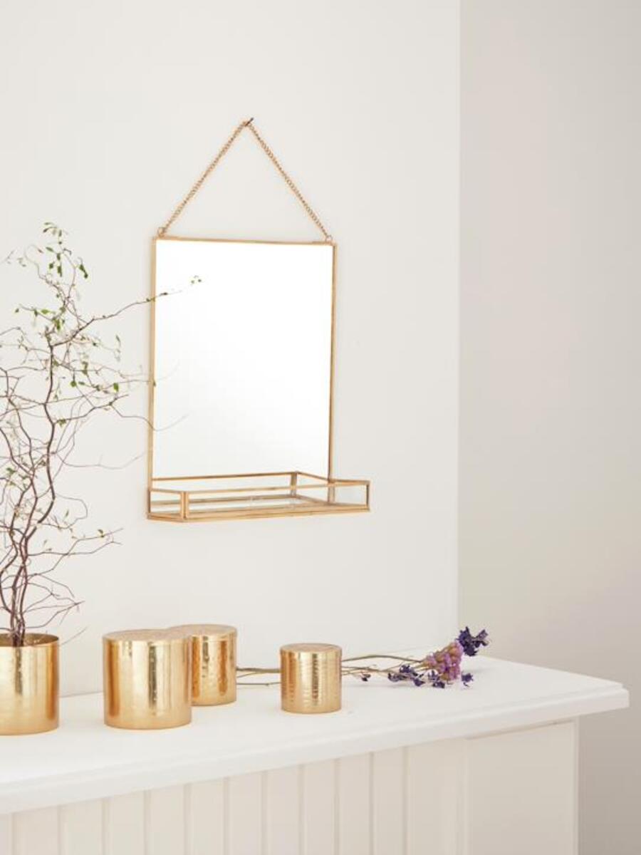 Miroir étagère en métal doré